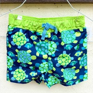 NWT 12-18 months UPF50+ sun protection. Mesh Liner. Adorable turtles. Swim Trunk